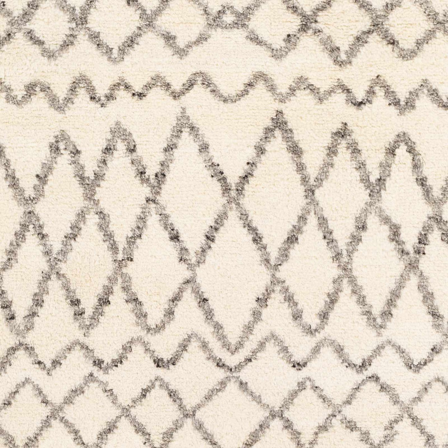 Manquin Area Rug - Clearance